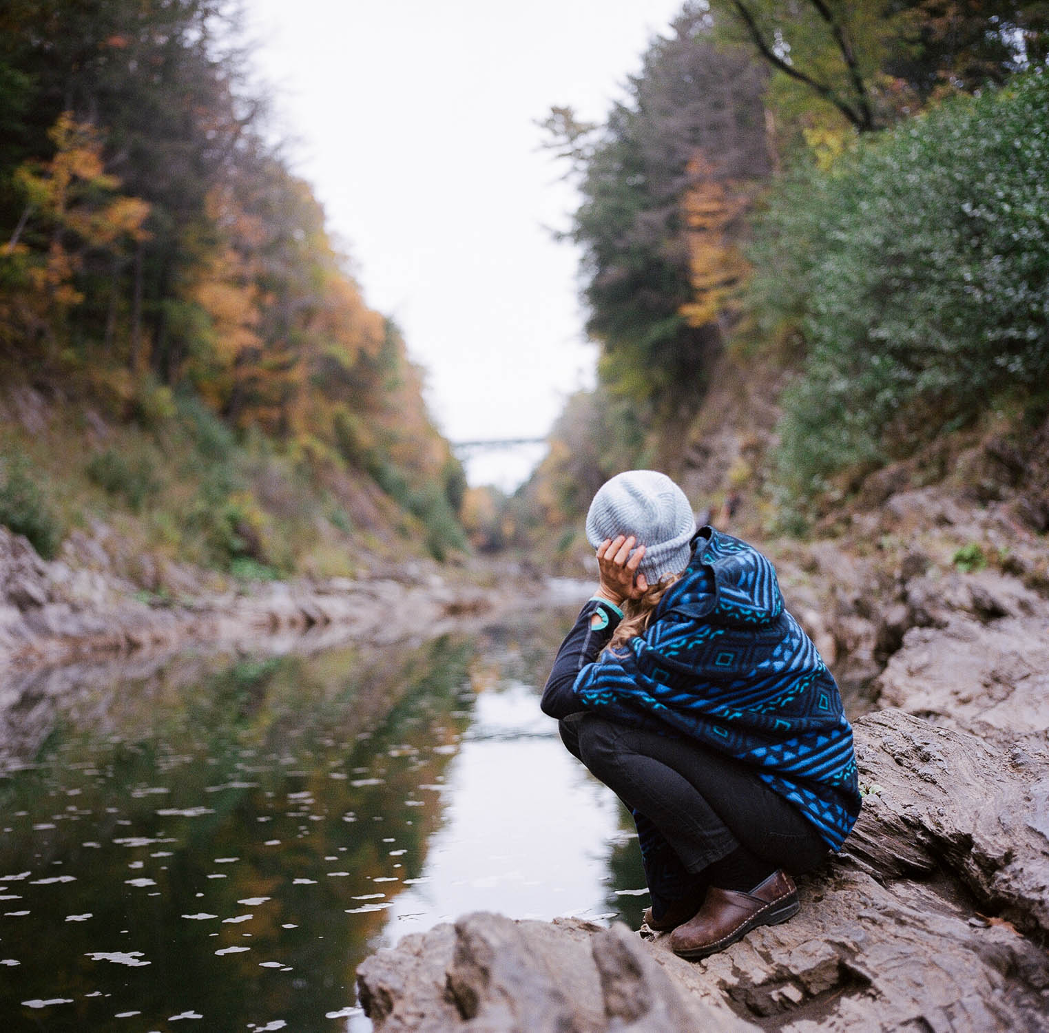 Kelsey at the water's edge in Quechee Gorge