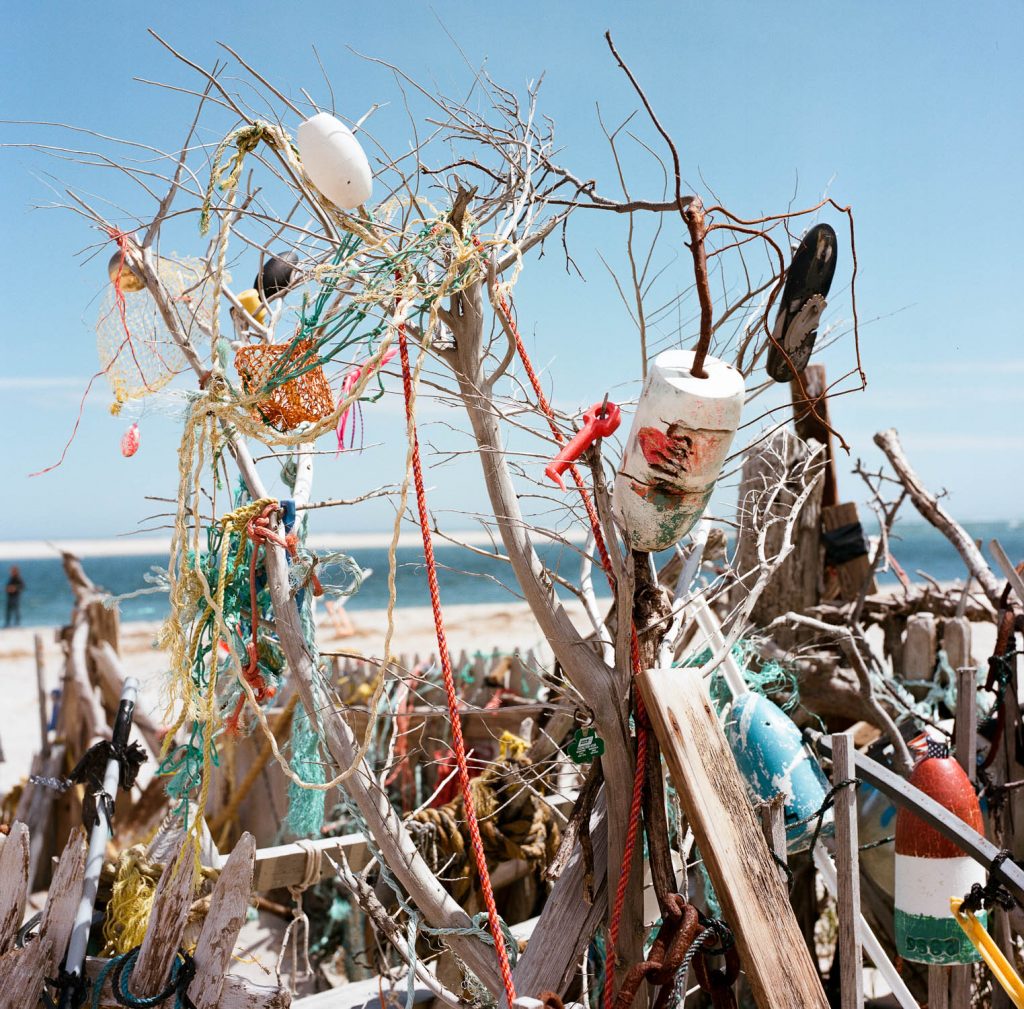 An installation of buoys and nets on the beach in Nantucket