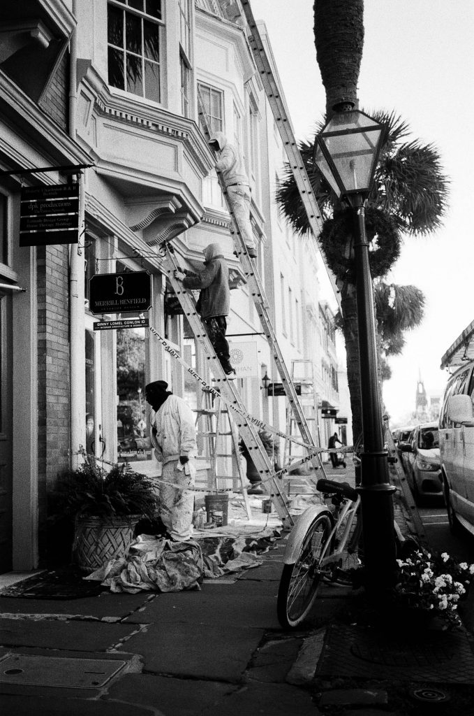 Three painters painting in Charleston, South Carolina