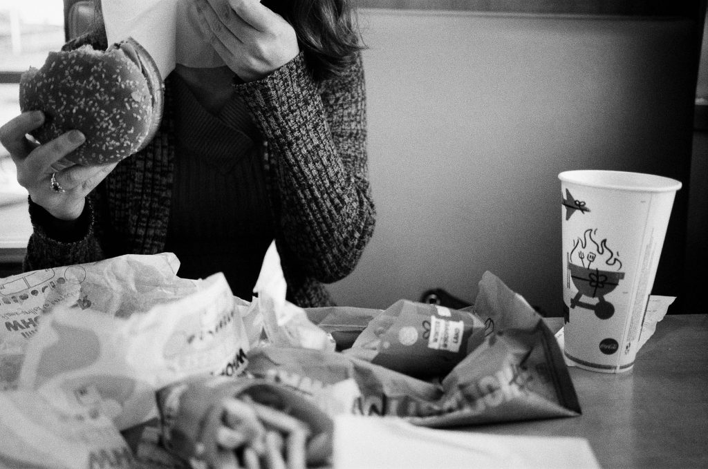 Keegan eating an Impossible Whopper at a Burger King near Charleston, South Carolina