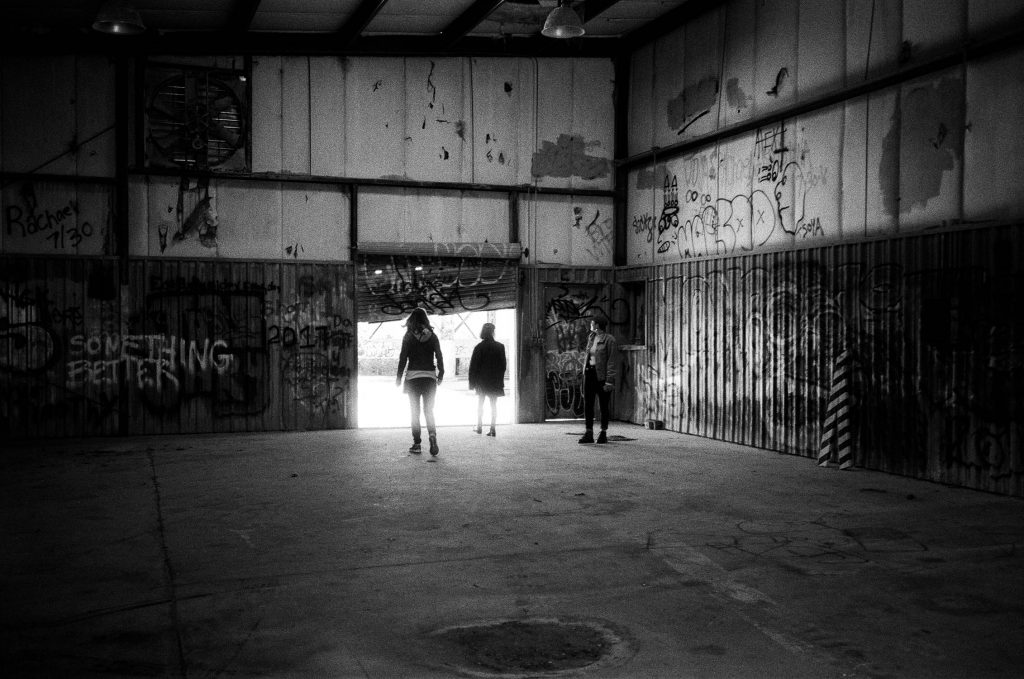 Friends in an abandoned building in Savannah, GA